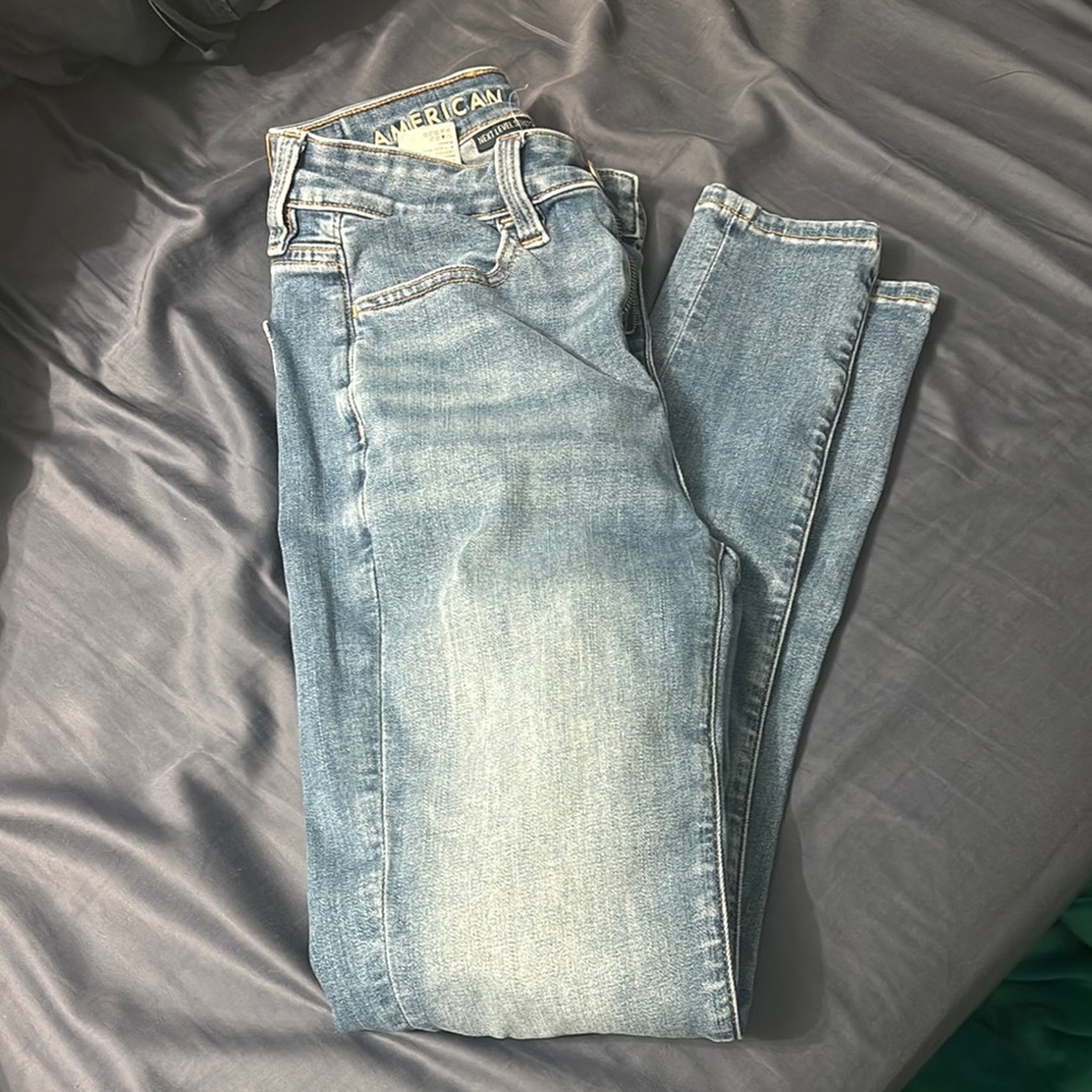 American Eagle Outfitters Blue Skinny Jeans with Vintage-Inspired Fading